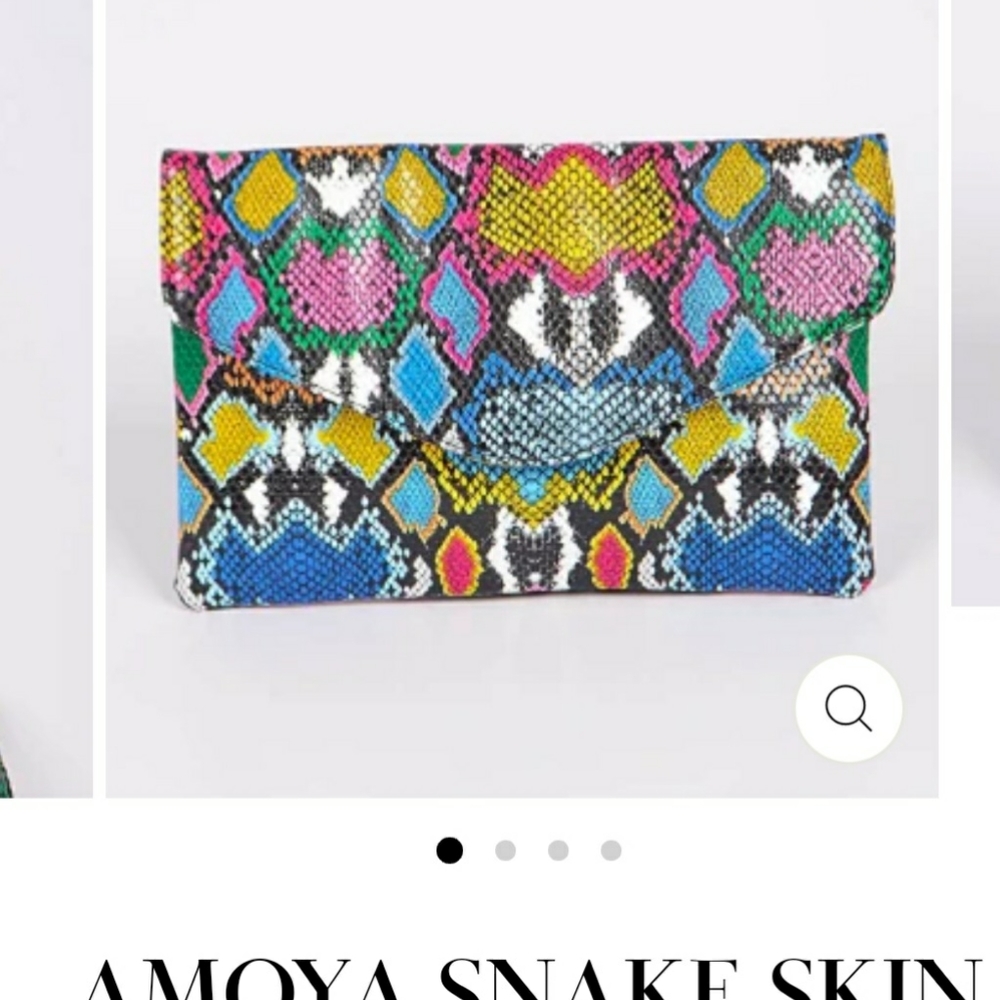Amoya snakeskin clutch.
